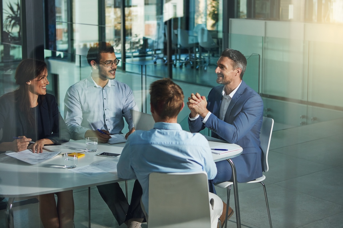 Business people, meeting and discussion for corporate planning, strategy or brainstorming at the office.