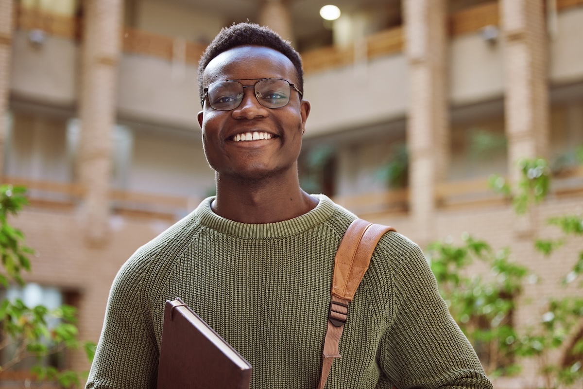 University student, man and portrait at campus for education, learning and studying in Atlanta